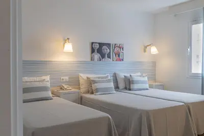Cama o camas de una habitación en FERGUS Club Pineda Splash