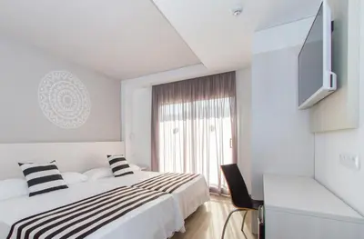 Cama o camas de una habitación en Hotel Oasis Park Splash