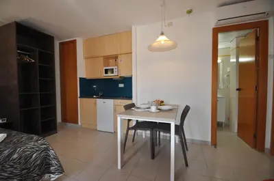 Una cocina o zona de cocina en Aparthotel Safari