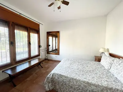 Cama o camas de una habitación en Villa Mas Blau Munt by Host&Joy
