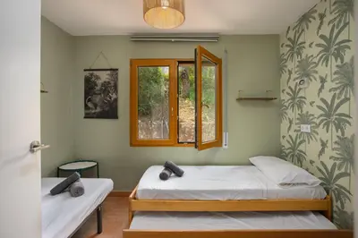 Cama o camas de una habitación en Apartament amb vista al mar reformat, al Golfet