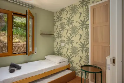 Cama o camas de una habitación en Apartament amb vista al mar reformat, al Golfet