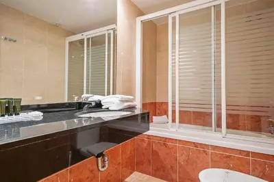 Un baño de Van der Valk Hotel Barcarola