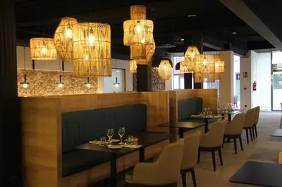 Un restaurante o sitio para comer en Hotel Delfín 4 Sup