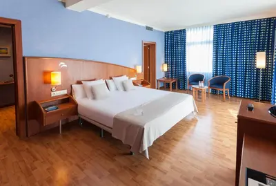 Cama o camas de una habitación en Hotel Delfín 4 Sup