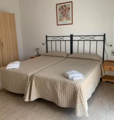 Cama o camas de una habitación en Aparthotel Iris