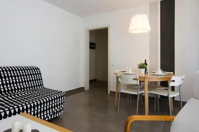 Zona de estar de Cute tiny flat near the beach and city center
