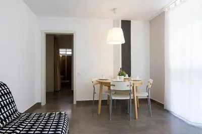 Zona de estar de Cute tiny flat near the beach and city center