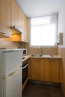 Una cocina o zona de cocina en Cute tiny flat near the beach and city center