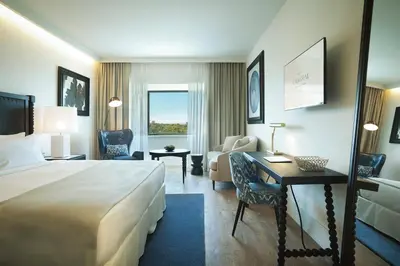 Cama o camas de una habitación en Hotel Camiral - The Leading Hotels of the World