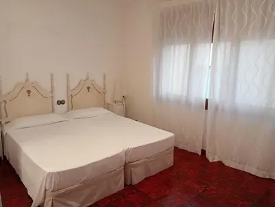 Cama o camas de una habitación en Hotel Rosa & Spa Begur
