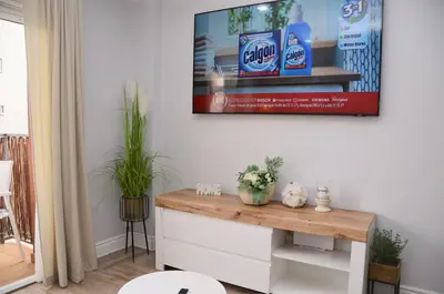 Una televisión o centro de entretenimiento en Apartamento Sofia