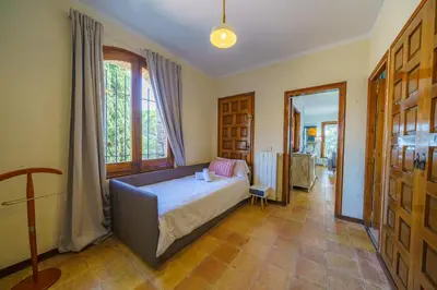 Cama o camas de una habitación en Villa Can Toni Vistas Mar Piscina Jacuzzi Aire Acondicionado