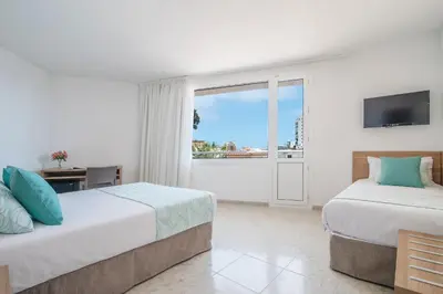 Cama o camas de una habitación en Hotel Lloret Santa Rosa by Pierre & Vacances