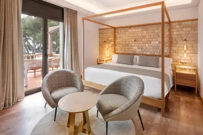Cama o camas de una habitación en Hotel Cala del Pi - Adults Only