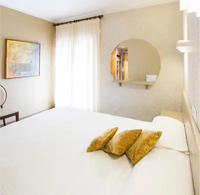 Cama o camas de una habitación en Hotel Esteba