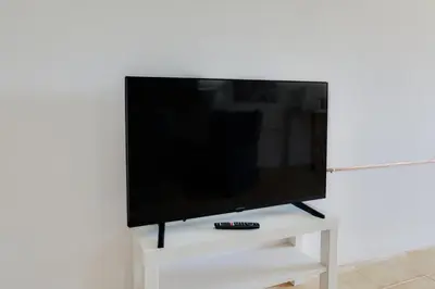 Una televisión o centro de entretenimiento en Villa Herlinda Costa Brava - With Swimming Pool
