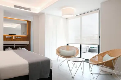Cama o camas de una habitación en KAKTUS Hotel Kaktus Playa