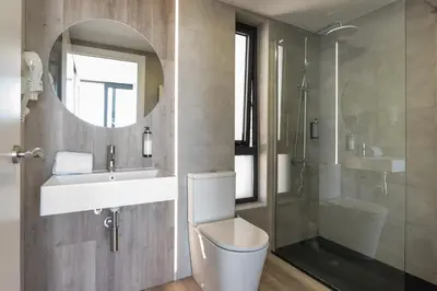 Un baño de Aparthotel Comtat Sant Jordi