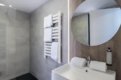 Un baño de Aparthotel Comtat Sant Jordi