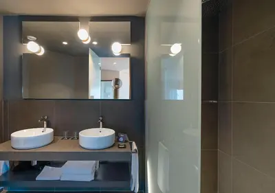 Un baño de AQUA Hotel Promenade & Spa 4Sup