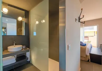Cama o camas de una habitación en AQUA Hotel Promenade & Spa 4Sup