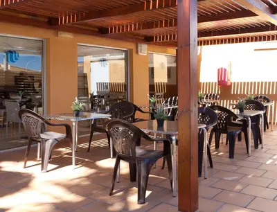 Un restaurante o sitio para comer en Hotel Turissa
