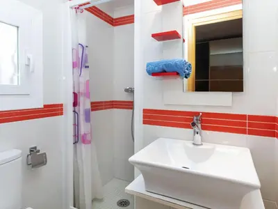 Un baño de Apartment Junco by Interhome