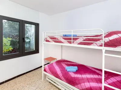 Cama o camas de una habitación en Holiday Home Can Delmas by Interhome