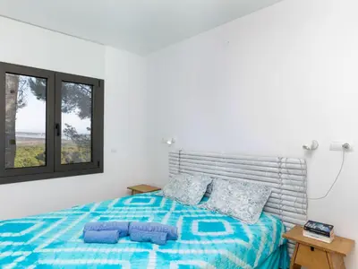 Cama o camas de una habitación en Holiday Home Can Delmas by Interhome