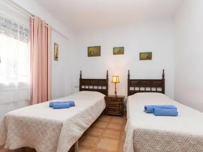 Cama o camas de una habitación en Apartment Albaniz by Interhome