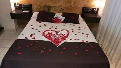 Cama o camas de una habitación en Hotel Spa Pinar del Mar