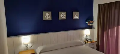 Cama o camas de una habitación en Hotel Garbi