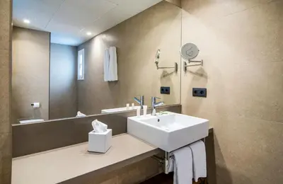 Un baño de Peninsular