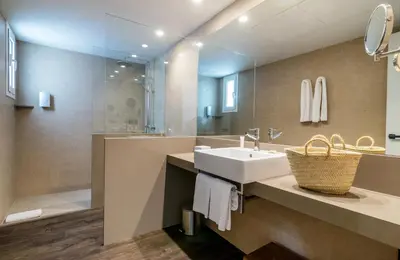 Un baño de Peninsular