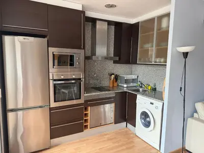 Una cocina o zona de cocina en Apartamento Edificio Lirios Politur