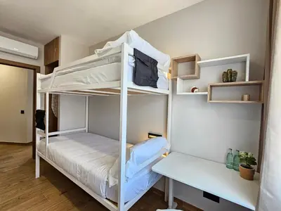 Cama o camas de una habitación en LAGOM Apartments NEW, 5 min walk from the sea