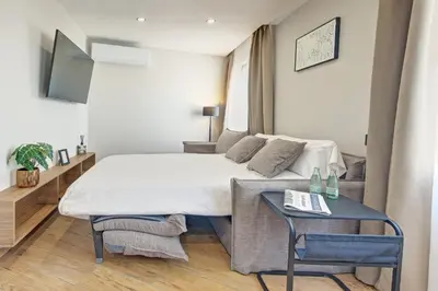 Cama o camas de una habitación en LAGOM Apartments NEW, 5 min walk from the sea