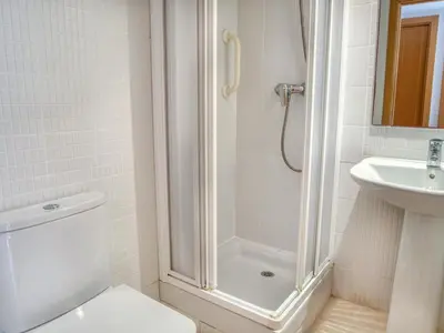 Un baño de Piso les Pites