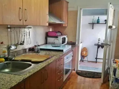 Una cocina o zona de cocina en Piso Palomar