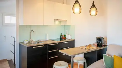 Una cocina o zona de cocina en Romantic Duplex with terrace and great views
