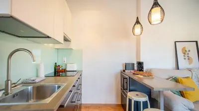 Una cocina o zona de cocina en Romantic Duplex with terrace and great views