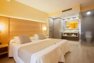 Cama o camas de una habitación en Hotel Pimar & Spa