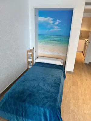 Cama o camas de una habitación en Loft vistes al mar 150 meters Optimist Trophy Esplanade