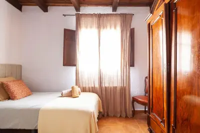 Cama o camas de una habitación en LOS TILOS Casa rural en el campo.