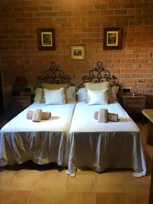 Cama o camas de una habitación en Casa rural en el campo LAS DALIAS