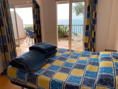 Cama o camas de una habitación en Bertur Cala Llevado