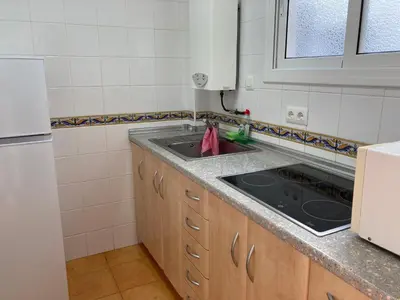 Una cocina o zona de cocina en Bertur Cala Llevado