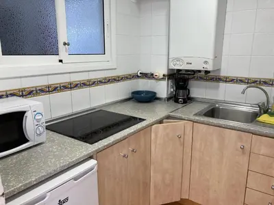 Una cocina o zona de cocina en Bertur Cala Llevado