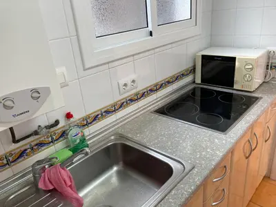Una cocina o zona de cocina en Bertur Cala Llevado